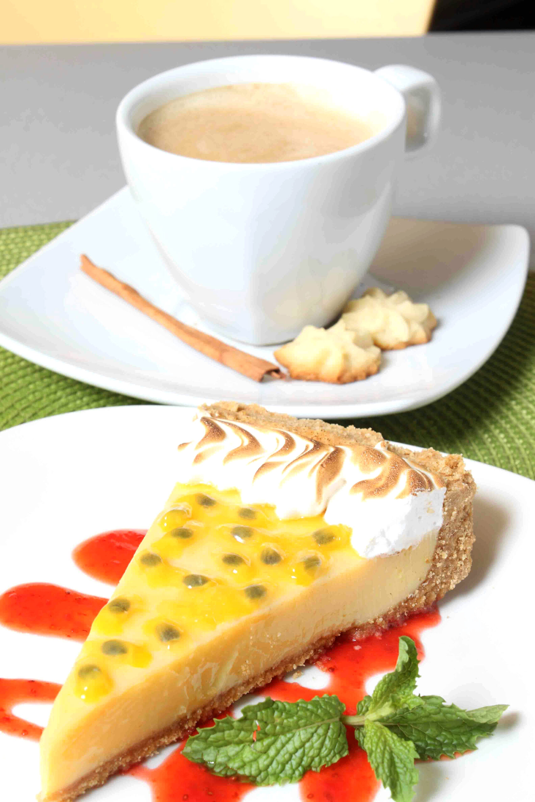 Passion Fruit Meringue Tart with Fresh Berry Sauce