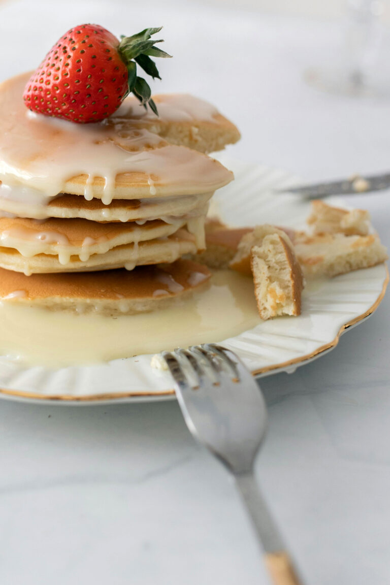 Fluffy Pancakes with Sweet Glaze and Fresh Strawberries