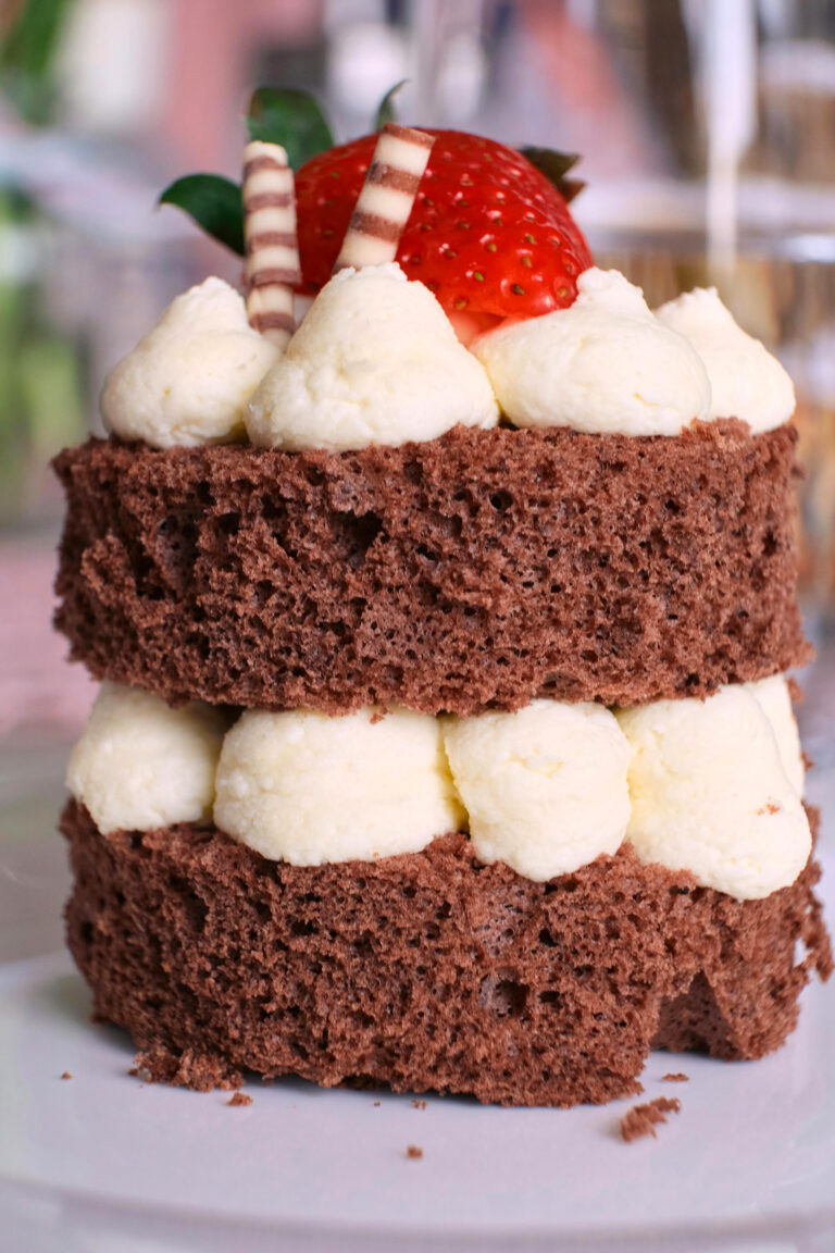 Moist Chocolate Cake with Cream Filling and Fresh Strawberries