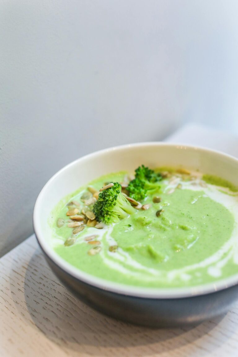 Creamy Broccoli Soup with Seeds and a Drizzle of Cream